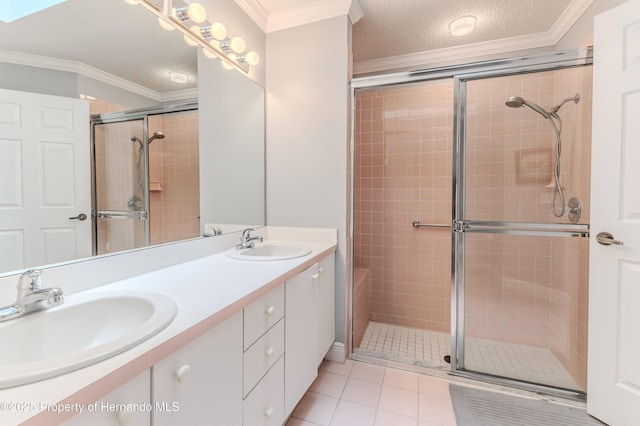 2481 Whispering Pines Ct, Spring Hill, FL 34606 - full bath featuring ornamental molding, a tile shower, tile patterned floors, double vanity, and a textured ceiling