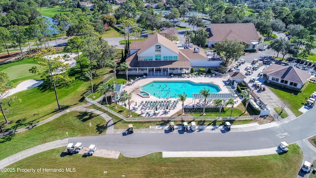 2481 Whispering Pines Ct, Spring Hill, FL 34606 - aerial view of a pool and a local golf course
