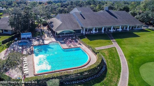 2481 Whispering Pines Ct, Spring Hill, FL 34606 - aerial view of property and surrounding area with a pool