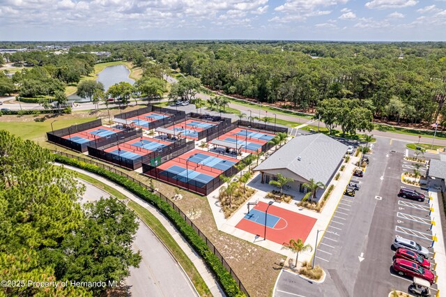 2481 Whispering Pines Ct, Spring Hill, FL 34606 - drone / aerial view of a forest and a large body of water