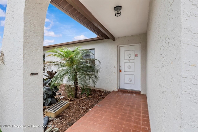 2450 Ambassador Ave, Spring Hill, FL 34609 - entrance to property featuring stucco siding