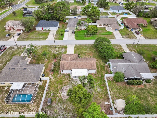 2450 Ambassador Ave, Spring Hill, FL 34609 - aerial view of property's location featuring nearby suburban area and a pool