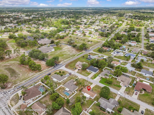 2450 Ambassador Ave, Spring Hill, FL 34609 - aerial overview of property's location with nearby suburban area