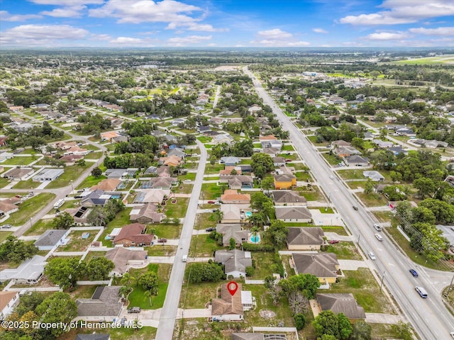 2450 Ambassador Ave, Spring Hill, FL 34609 - aerial overview of property's location with nearby suburban area