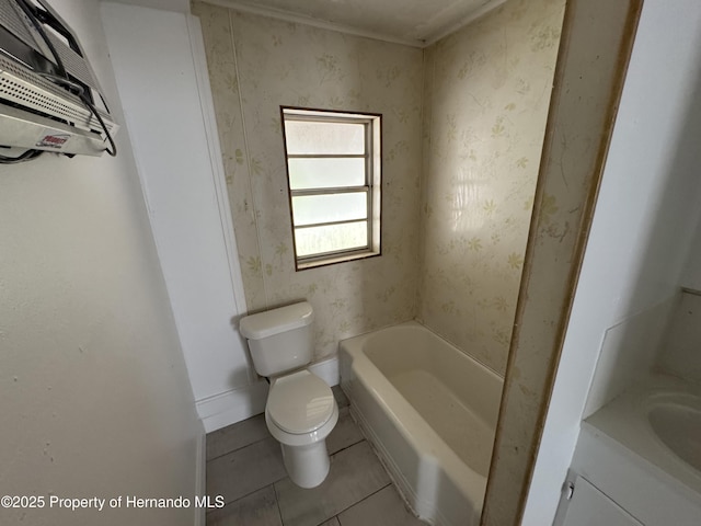221 Highland St, Brooksville, FL 34601 - bathroom featuring toilet, a bath, tile patterned flooring, and vanity