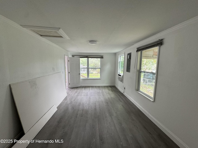 221 Highland St, Brooksville, FL 34601 - empty room with dark wood-style flooring, baseboards, and ornamental molding