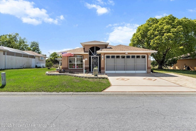 10485 S Drew Bryant Cir, Floral City, FL 34436 - ranch-style home featuring concrete driveway, a garage, stucco siding, and a front yard