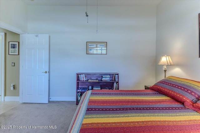 9406 Burnam Dr, Weeki Wachee, FL 34613 - carpeted bedroom featuring baseboards