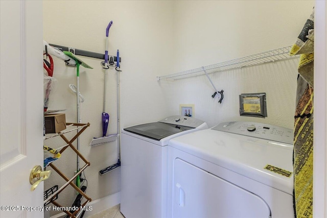 9406 Burnam Dr, Weeki Wachee, FL 34613 - washroom with washing machine and clothes dryer