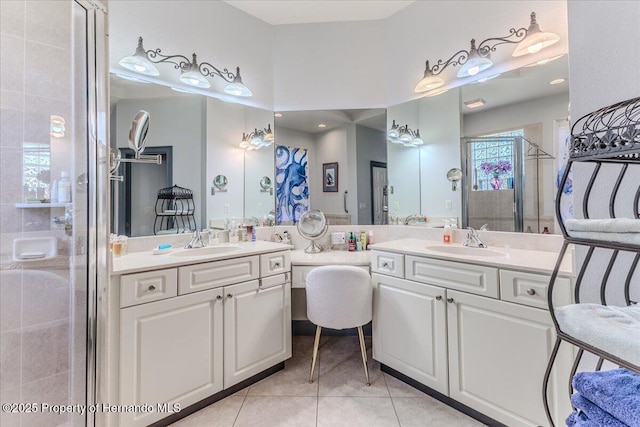 9406 Burnam Dr, Weeki Wachee, FL 34613 - full bathroom featuring vanity, a shower stall, and tile patterned flooring