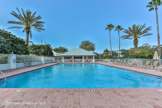 9406 Burnam Dr, Weeki Wachee, FL 34613 - community pool with a patio