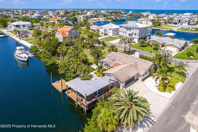 4566 Gulfstream Dr, Hernando Beach, FL 34607 - aerial perspective of suburban area with a nearby body of water