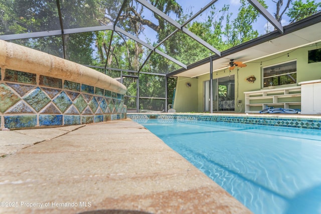 9766 W Smokey Ln, Crystal River, FL 34429 - outdoor pool featuring ceiling fan, a patio area, and a lanai