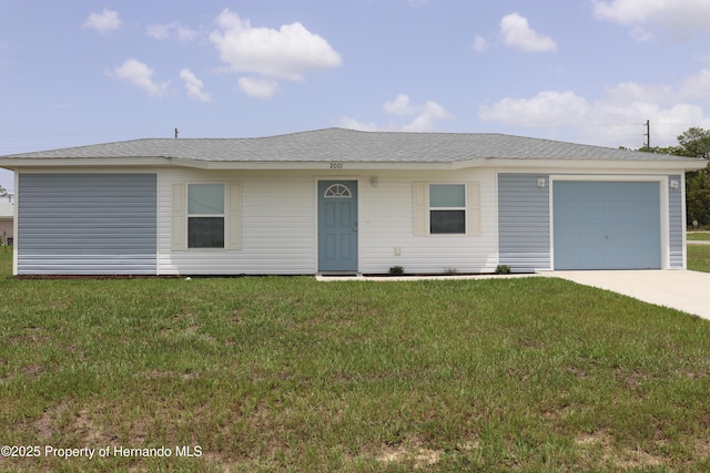 2001 W Royal Palm Dr, Dunnellon, FL 34434 - ranch-style house with driveway, a front yard, and an attached garage