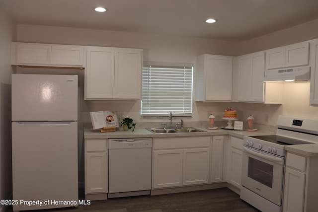 2001 W Royal Palm Dr, Dunnellon, FL 34434 - kitchen featuring white appliances, under cabinet range hood, a sink, white cabinetry, and recessed lighting