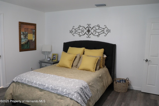 2001 W Royal Palm Dr, Dunnellon, FL 34434 - bedroom featuring dark wood-style floors and baseboards