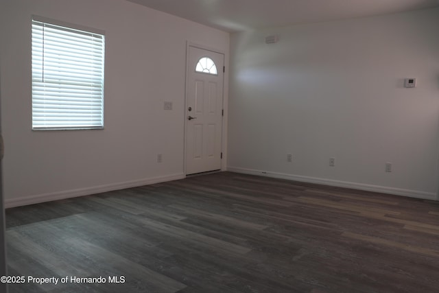 2001 W Royal Palm Dr, Dunnellon, FL 34434 - entryway featuring dark wood finished floors and baseboards
