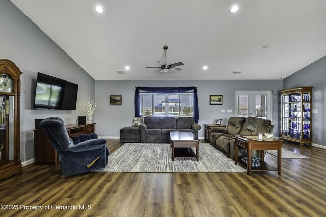 4123 Daisy Dr, Hernando Beach, FL 34607 - living area with wood finished floors, ceiling fan, baseboards, recessed lighting, and vaulted ceiling