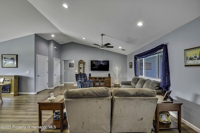 4123 Daisy Dr, Hernando Beach, FL 34607 - living room featuring a ceiling fan, vaulted ceiling, dark wood-style flooring, baseboards, and recessed lighting