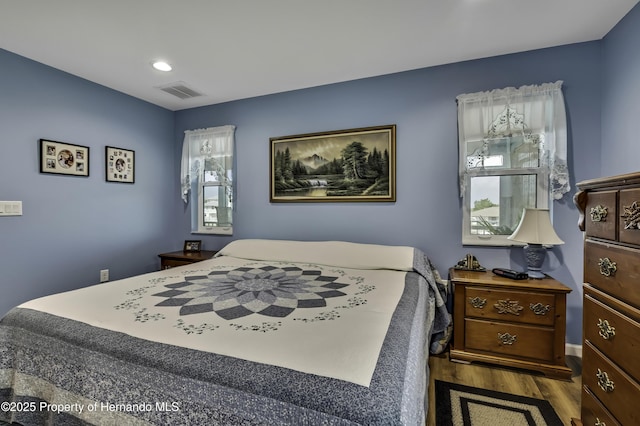 4123 Daisy Dr, Hernando Beach, FL 34607 - bedroom featuring wood finished floors and recessed lighting