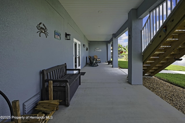 4123 Daisy Dr, Hernando Beach, FL 34607 - view of patio with french doors and stairway