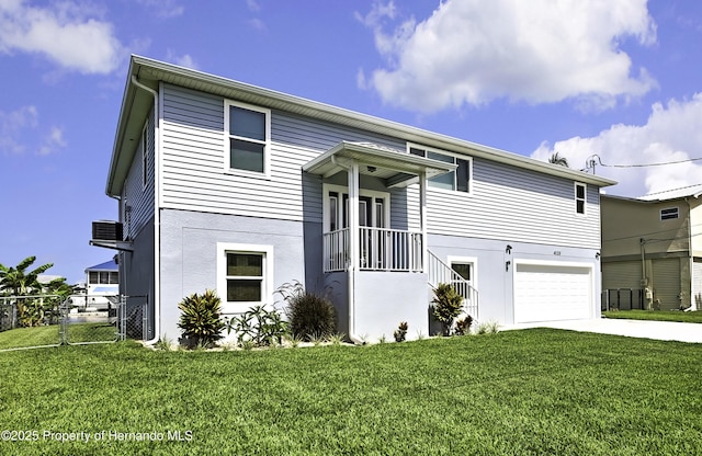 4123 Daisy Dr, Hernando Beach, FL 34607 - view of front of house with an attached garage, concrete driveway, stucco siding, and central AC