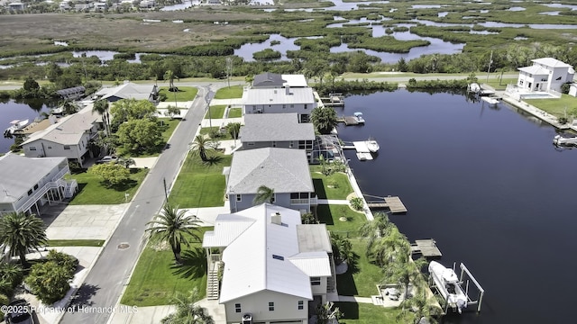 4123 Daisy Dr, Hernando Beach, FL 34607 - aerial perspective of suburban area featuring a nearby body of water