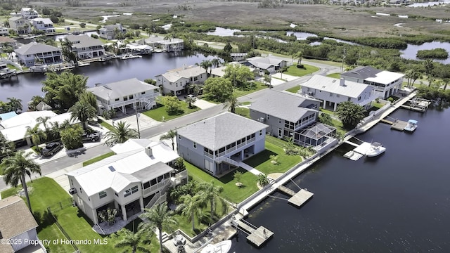 4123 Daisy Dr, Hernando Beach, FL 34607 - aerial view of residential area featuring a nearby body of water