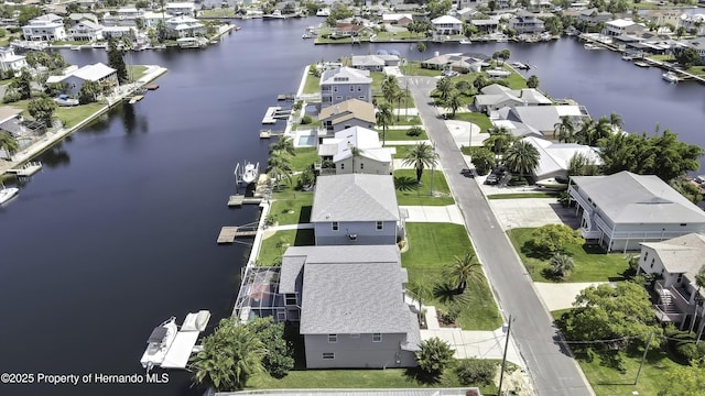 4123 Daisy Dr, Hernando Beach, FL 34607 - aerial perspective of suburban area featuring a large body of water