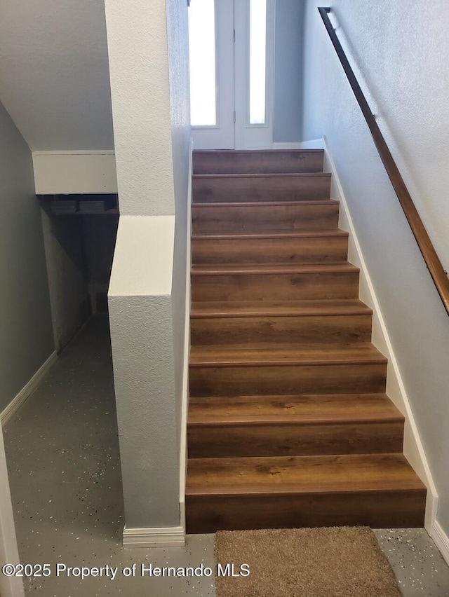 4123 Daisy Dr, Hernando Beach, FL 34607 - stairs featuring baseboards