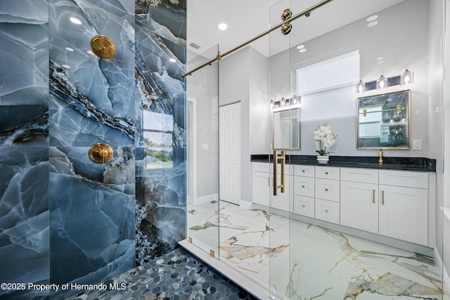 5317 Lydia Ct, Spring Hill, FL 34608 - full bathroom with marble tiled floors, a marble finish shower, double vanity, and recessed lighting