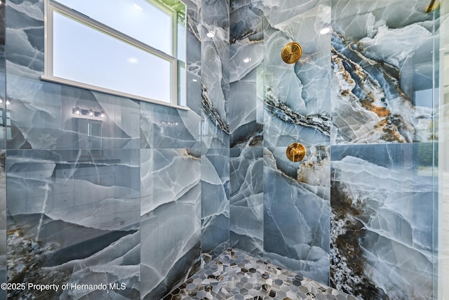 5317 Lydia Ct, Spring Hill, FL 34608 - bathroom with a marble finish shower