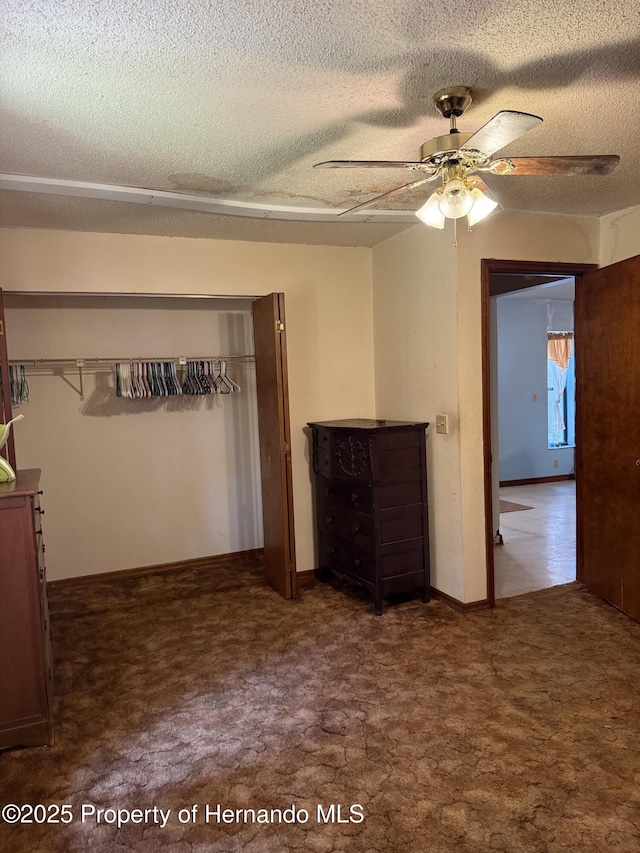 7239 Lykes Dublin Rd, Brooksville, FL 34601 - unfurnished room with ceiling fan, a textured ceiling, and carpet