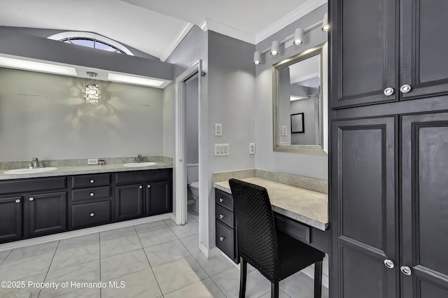 10277 Rosetti Ct, Spring Hill, FL 34608 - full bath with ornamental molding, double vanity, toilet, tile patterned floors, and vaulted ceiling