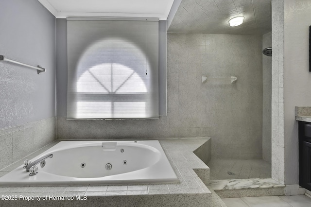 10277 Rosetti Ct, Spring Hill, FL 34608 - bathroom featuring a jetted tub, tiled shower, and vanity