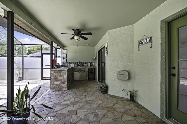 10277 Rosetti Ct, Spring Hill, FL 34608 - view of patio featuring a ceiling fan, wine cooler, area for grilling, and a lanai