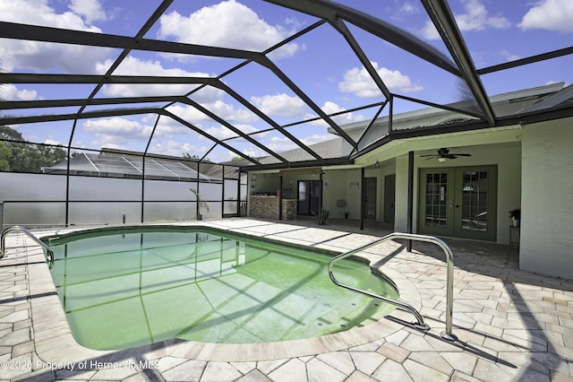 10277 Rosetti Ct, Spring Hill, FL 34608 - outdoor pool with french doors, a patio area, a ceiling fan, and a lanai