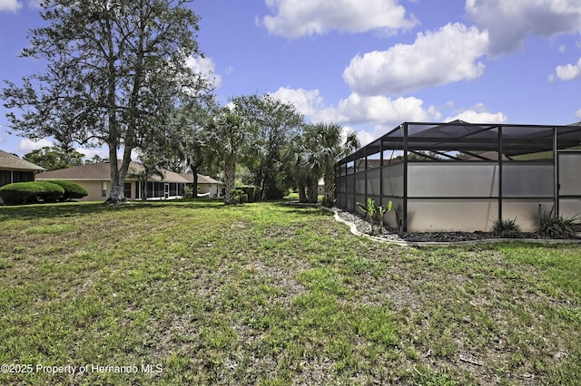 10277 Rosetti Ct, Spring Hill, FL 34608 - view of grassy yard featuring glass enclosure
