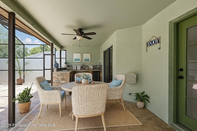 10277 Rosetti Ct, Spring Hill, FL 34608 - sunroom with a ceiling fan and outdoor dining space