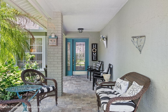 2486 Deer Trail Ln, Spring Hill, FL 34606 - view of exterior entry with stucco siding