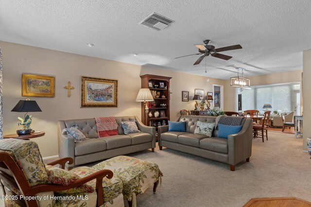2486 Deer Trail Ln, Spring Hill, FL 34606 - living room featuring ceiling fan, a textured ceiling, and light carpet