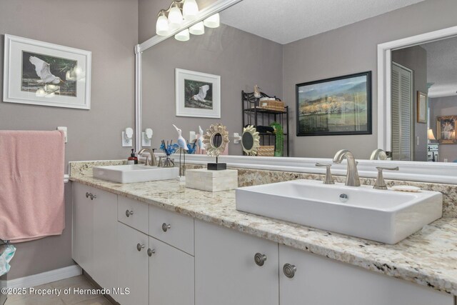 2486 Deer Trail Ln, Spring Hill, FL 34606 - bathroom featuring double vanity
