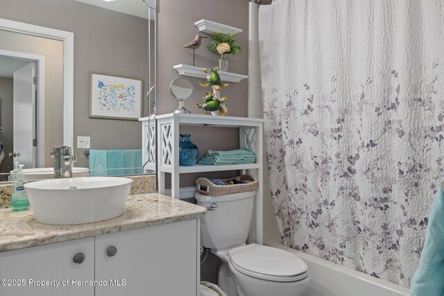 2486 Deer Trail Ln, Spring Hill, FL 34606 - bathroom with vanity, toilet, and shower / tub combo