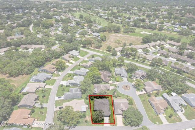 2486 Deer Trail Ln, Spring Hill, FL 34606 - aerial view of property's location featuring nearby suburban area and property parcel outlined