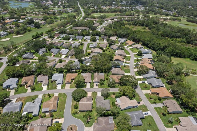 2486 Deer Trail Ln, Spring Hill, FL 34606 - view of property location with nearby suburban area, a nearby body of water, and a golf club