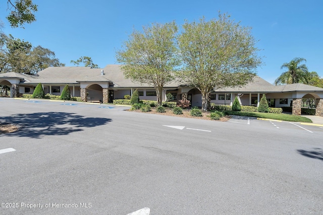 2486 Deer Trail Ln, Spring Hill, FL 34606 - view of front facade featuring uncovered parking