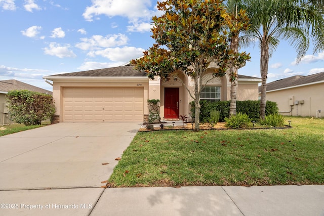 18710 Dobson Dr, Hudson, FL 34667 - view of front of house with stucco siding, a garage, concrete driveway, and a front yard