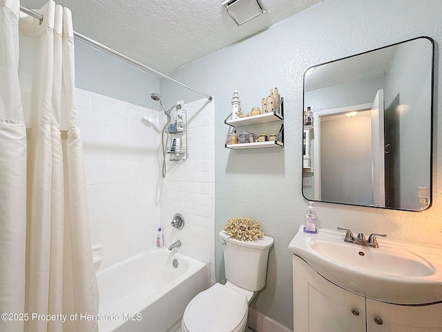 1531 NE 38th St, Ocala, FL 34479 - bathroom featuring vanity, a textured ceiling, shower / bathtub combination with curtain, toilet, and a textured wall