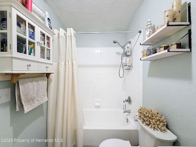 1531 NE 38th St, Ocala, FL 34479 - bathroom with toilet, a textured ceiling, and shower / tub combo with curtain