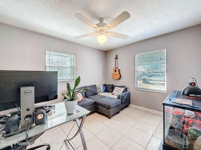 1531 NE 38th St, Ocala, FL 34479 - office with ceiling fan, light tile patterned flooring, a textured ceiling, and baseboards